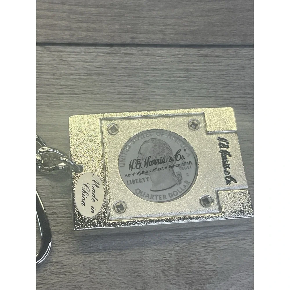 H.E. Harris Flag Keychain New Old Stock Car Truck American Flag Silver Plated